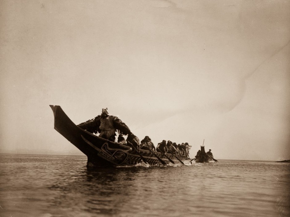 1914, Kwakiutl people in canoes in British Columbia.