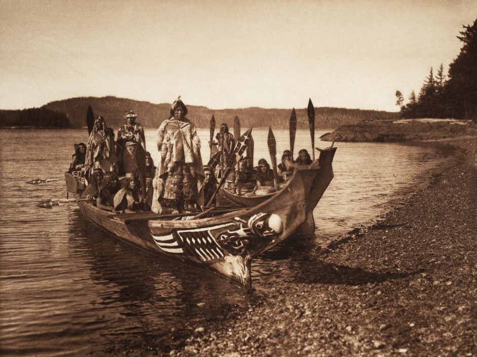 1914, A Kwakiutl wedding party arrives in canoes.